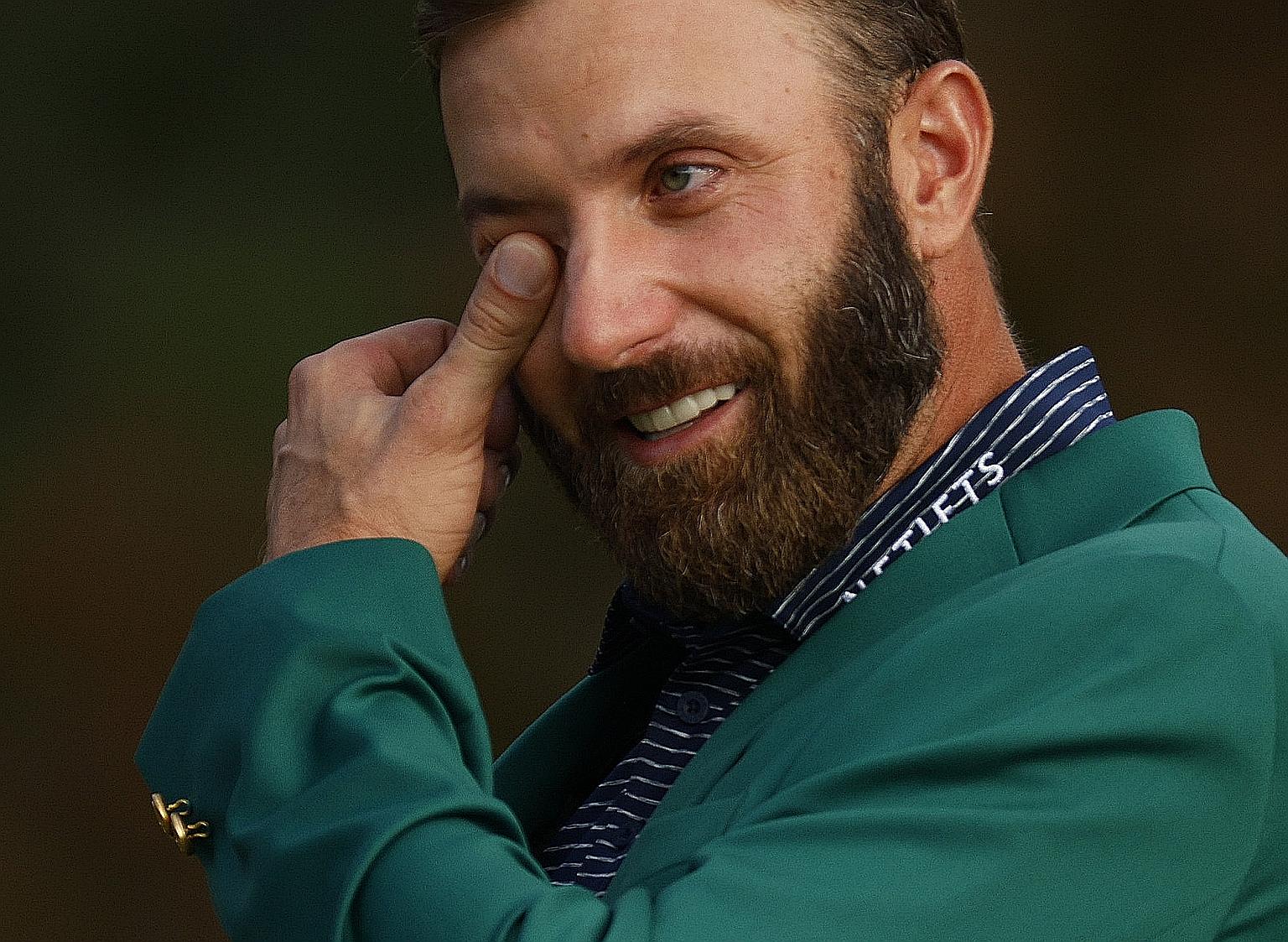 A teary world No. 1 Dustin Johnson celebrating in his green jacket after winning The Masters at Augusta National on Sunday to secure a second Major title. It is his fourth tournament victory this year.