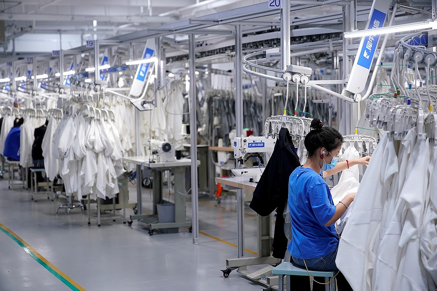Xunxi factory, an affiliate of Chinese e-commerce giant Alibaba, in Hangzhou last week. China's industrial sector has staged an impressive turnaround from the pandemic paralysis seen earlier this year. PHOTO: REUTERS