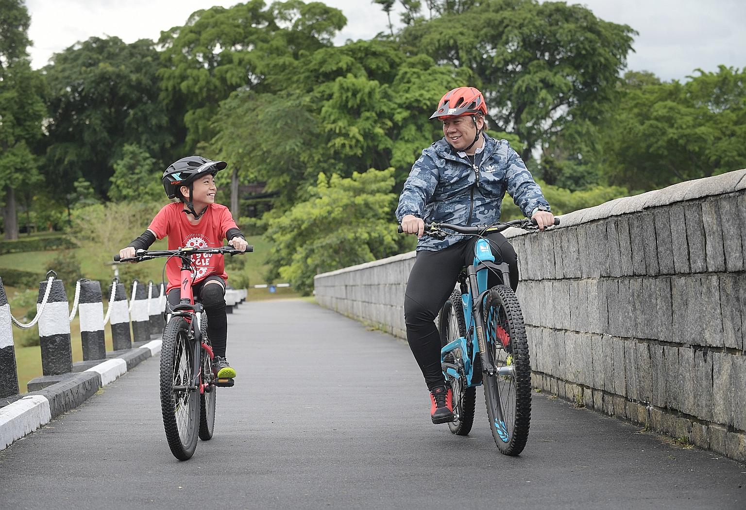 Nine-year-old Zachariah Chan took part in the OCBC Cycle's Mighty Savers Kids Virtual Ride and completed 50km - 10 times more than the required 5km - in a single ride from East Coast to his home in Lorong Ah Soo with his 40-year-old father Kamarul Za