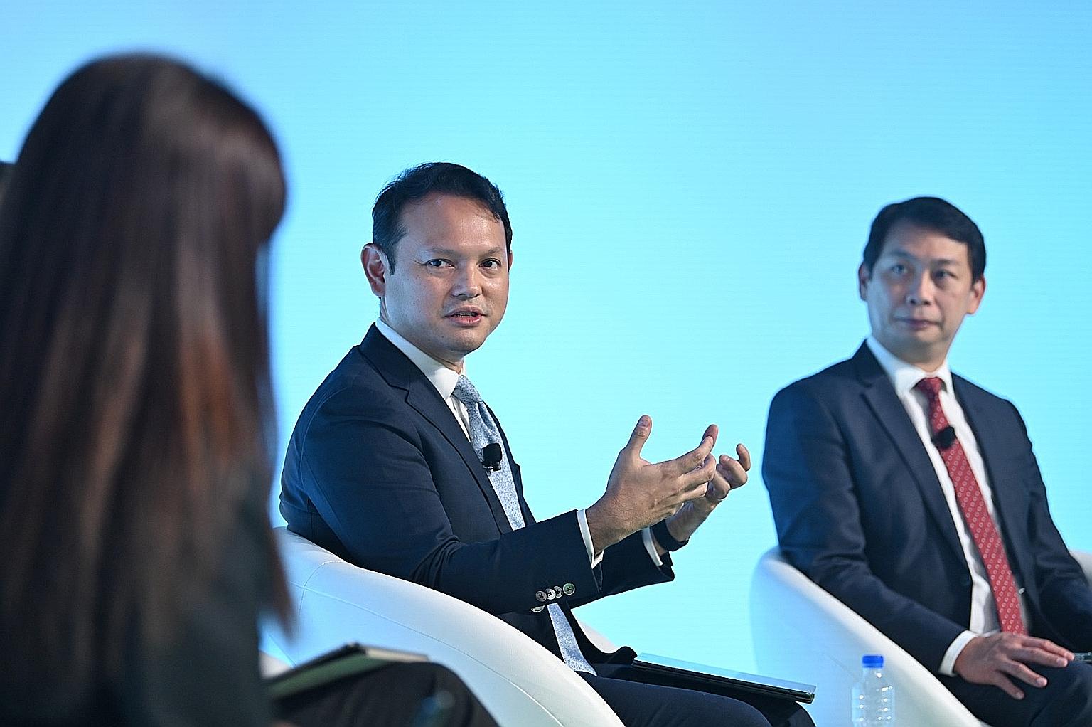 Senior Minister of State for Manpower and Defence Zaqy Mohamad and Singapore National Employers Federation vice-president Douglas Foo (right) at the Singapore Workplace Safety and Health Conference yesterday.
