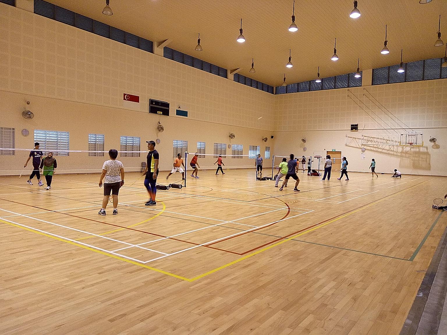 Members of the public playing badminton at the indoor hall of East Spring Primary School, before the Covid-19 pandemic. The hall is one of 169 facilities under the Dual-Use Scheme that will be reopened to the public during the year-end school holiday