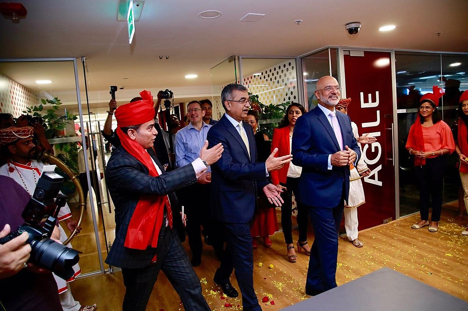 DBS Group chief executive Piyush Gupta (right) at the inauguration of DBS India's new headquarters in Mumbai in 2017. DBS is one of only two foreign banks in India with wholly owned subsidiary status. PHOTO: DBS