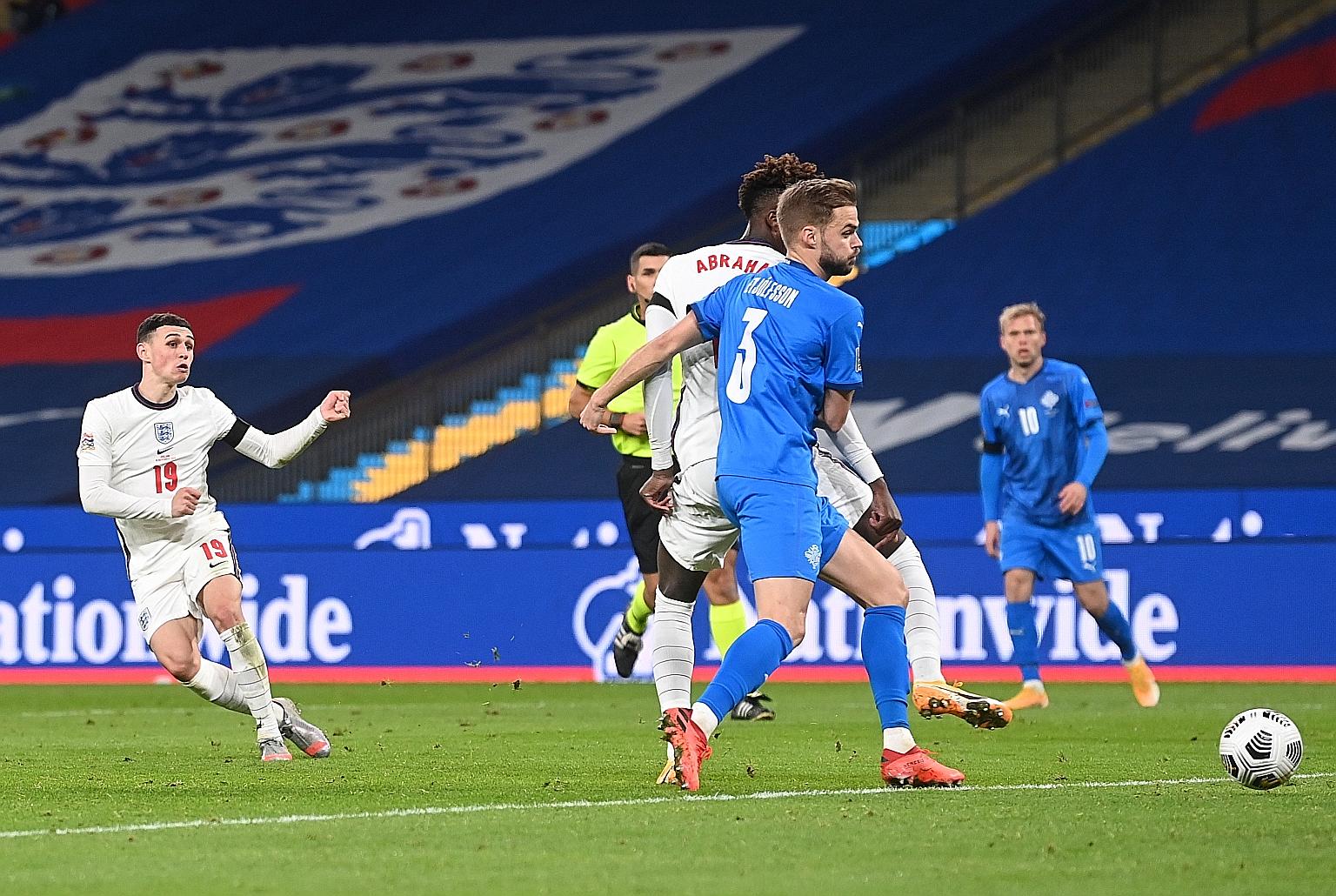 Phil Foden netting his first international goal against Iceland at Wembley on Wednesday. He added another to mark his England return after being dropped from the last squad.