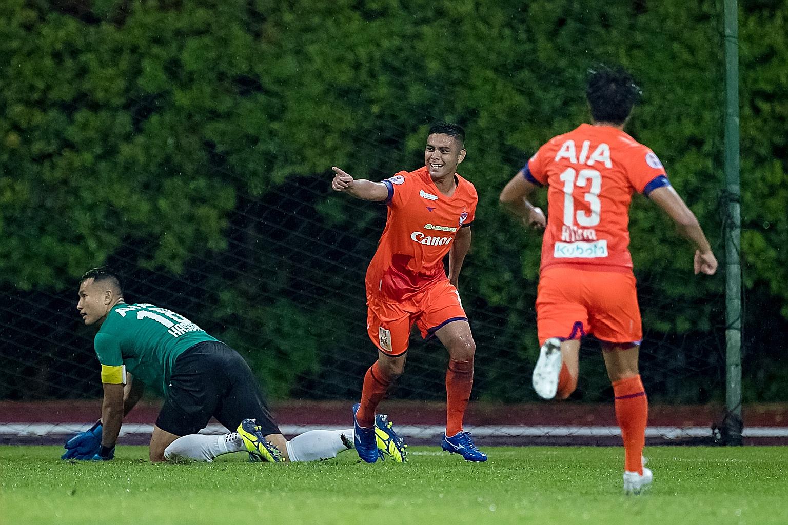 Albirex forward Fairoz Hasan celebrating his goal that put the side 2-1 up against the Lion City Sailors in their SPL match at Bishan Stadium yesterday.