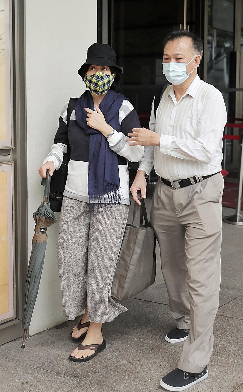 Madam Chan Hui Peng, seen here with her husband Sim Kuang Jui, says the 2015 accident caused her to suffer from PTSD and schizophrenia. ST PHOTO: GAVIN FOO