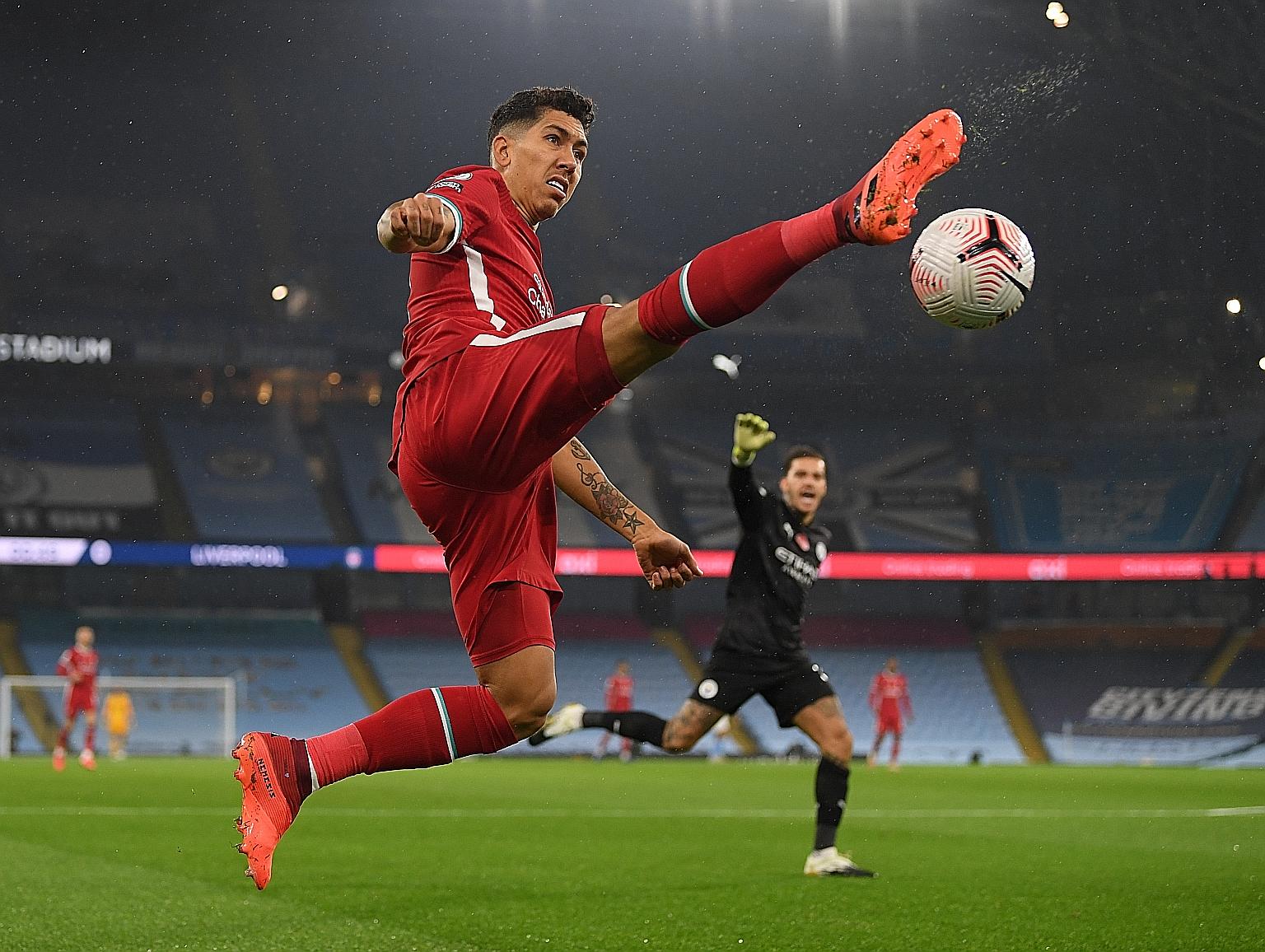 Liverpool's Roberto Firmino playing against Man City this month. Manager Jurgen Klopp lauded his contribution even when he was not scoring.