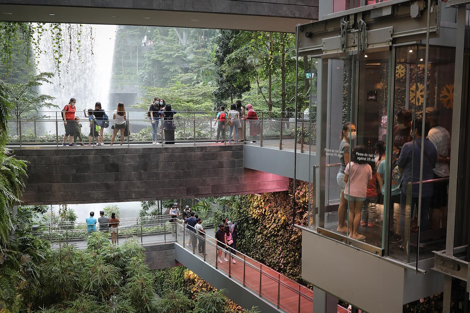 People visiting Jewel Changi Airport on Monday. Yesterday marked the 14th day in a row with no new community cases and none from worker dormitories. This is the longest stretch without a community case since the first coronavirus case was reported in