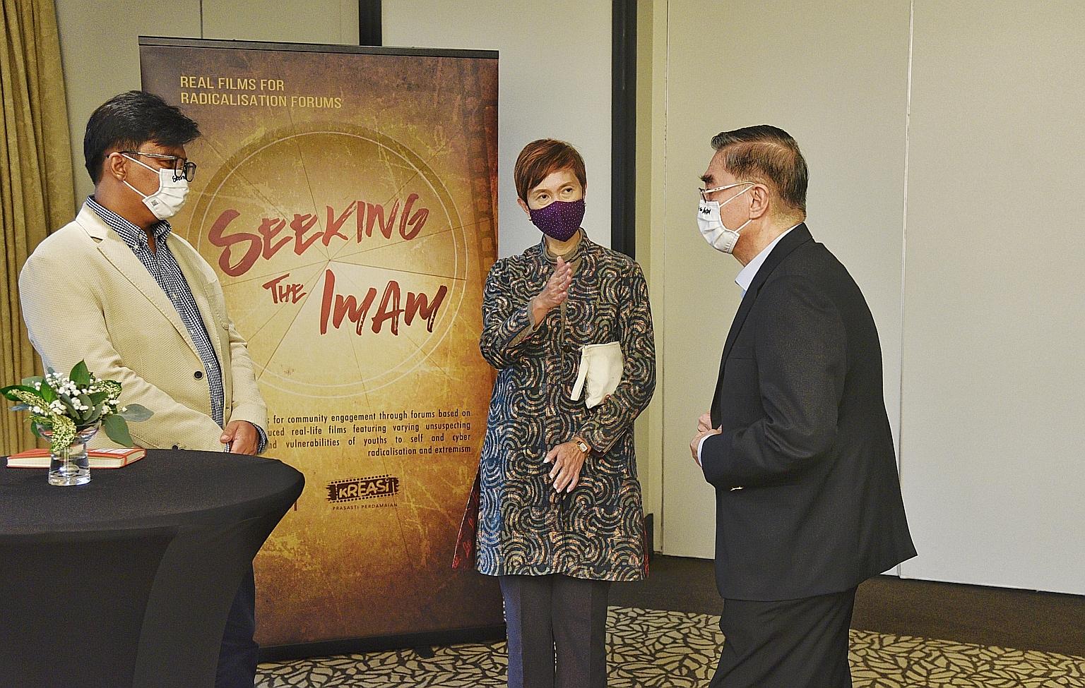 Second Minister for Home Affairs Josephine Teo, with terrorism expert Noor Huda Ismail (left), one of the producers of the film Seeking The Imam, and Mr Ong Keng Yong, chairman of Humanity Matters, at the film's premiere yesterday. The film will be s
