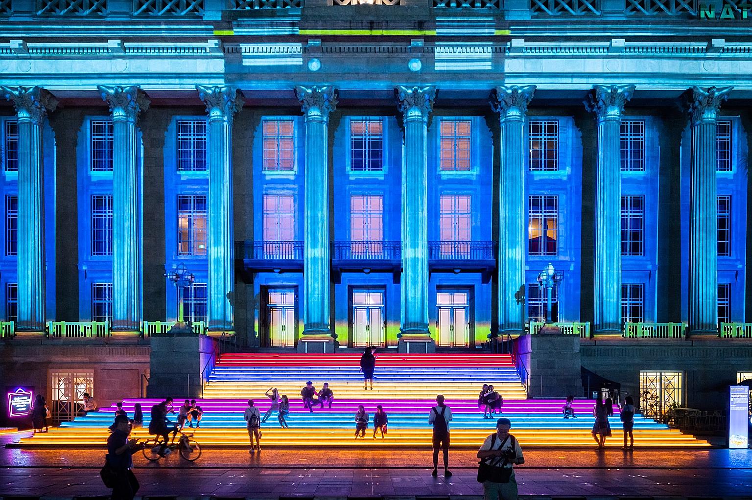 A past edition of the Light To Night Festival (above) in the Civic District, which will return for Singapore Art Week next year.