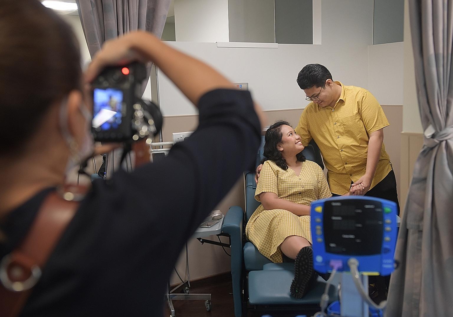 Ms Artika Raemi and Mr Aziz Abdullah at their wedding photo shoot at the chemotherapy bay of the National University Cancer Institute, Singapore. They decided to take photos there as the place serves as a reminder of how they overcame the toughest ph