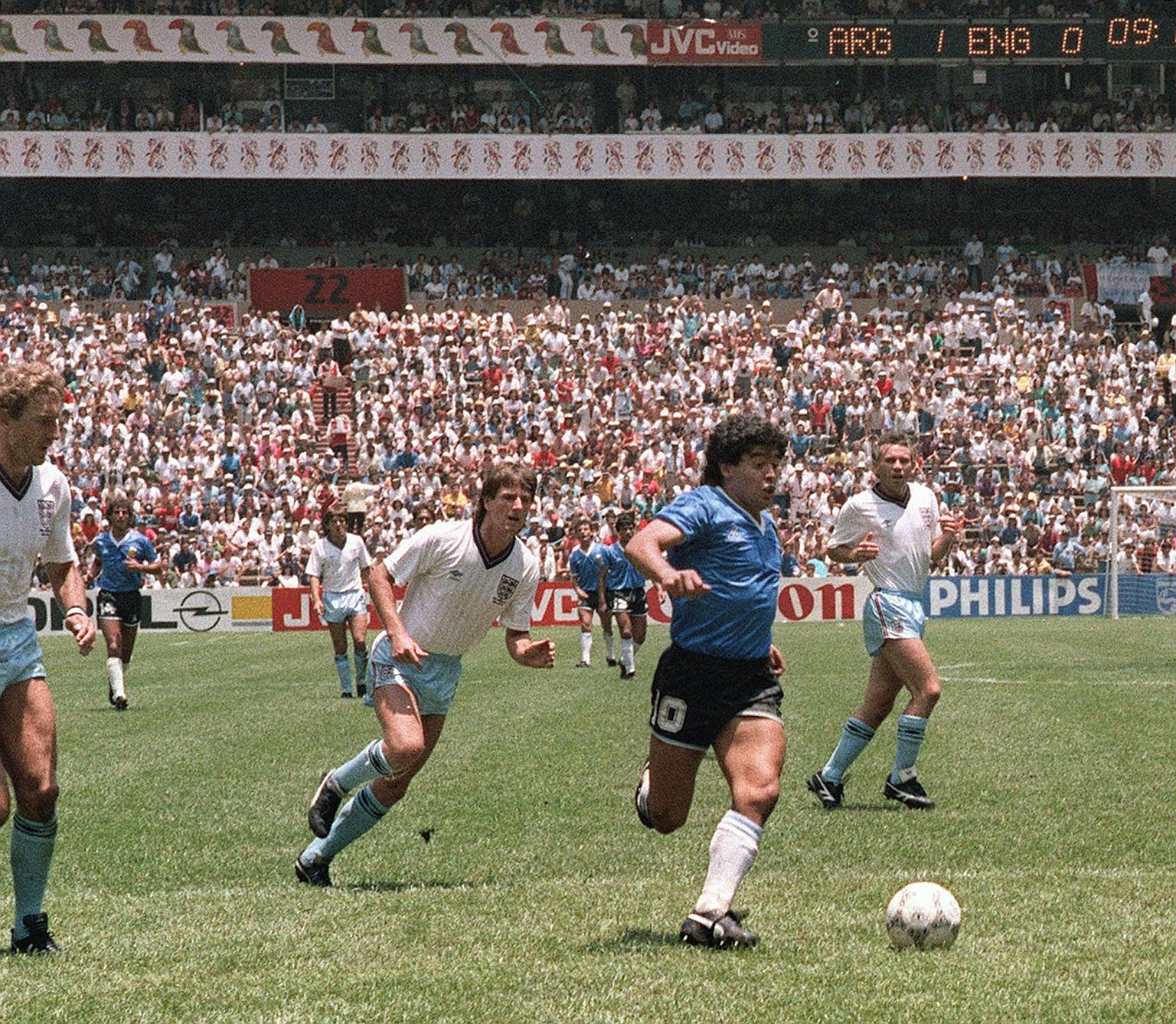 Diego Maradona on a dazzling run in which he went past six English players to put Argentina 2-0 up in their 1986 World Cup quarter-final in Mexico City. He had earlier cheated in scoring the "Hand of God" goal. The team eventually won their second ti