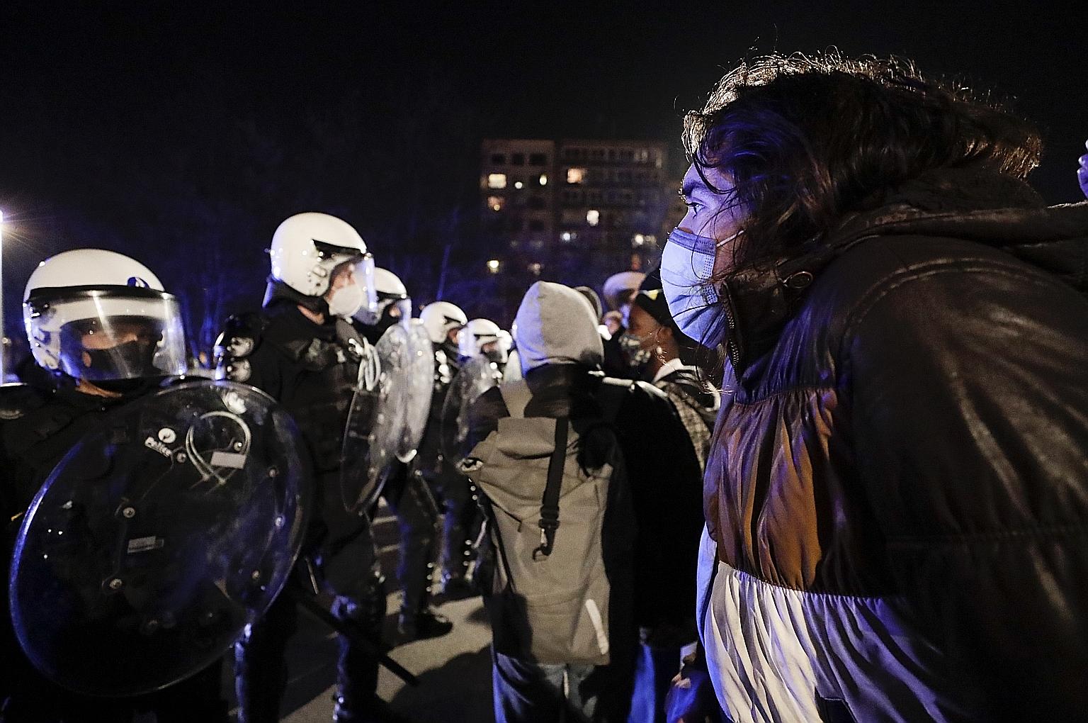 People protesting against a Covid-19 curfew in Liege, Belgium, on Saturday. The virus has claimed 16,219 lives in the country of 11 million.