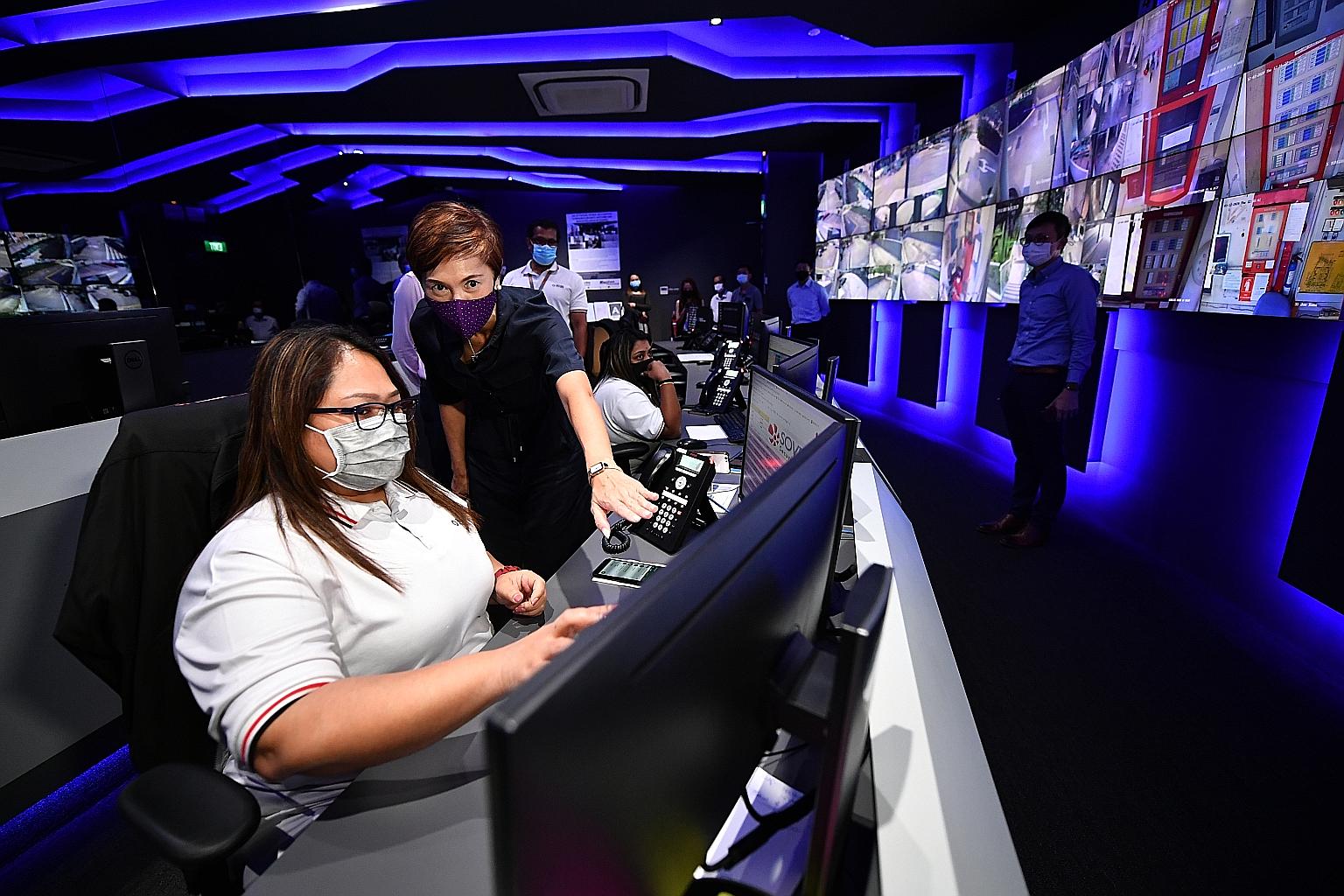 Manpower Minister Josephine Teo with Ms Roslina Mohd Sharif, 49, a controller at the Secura Integrated Command Centre, during a visit yesterday. Employment of local residents - Singaporeans and permanent residents - rebounded in the third quarter, an