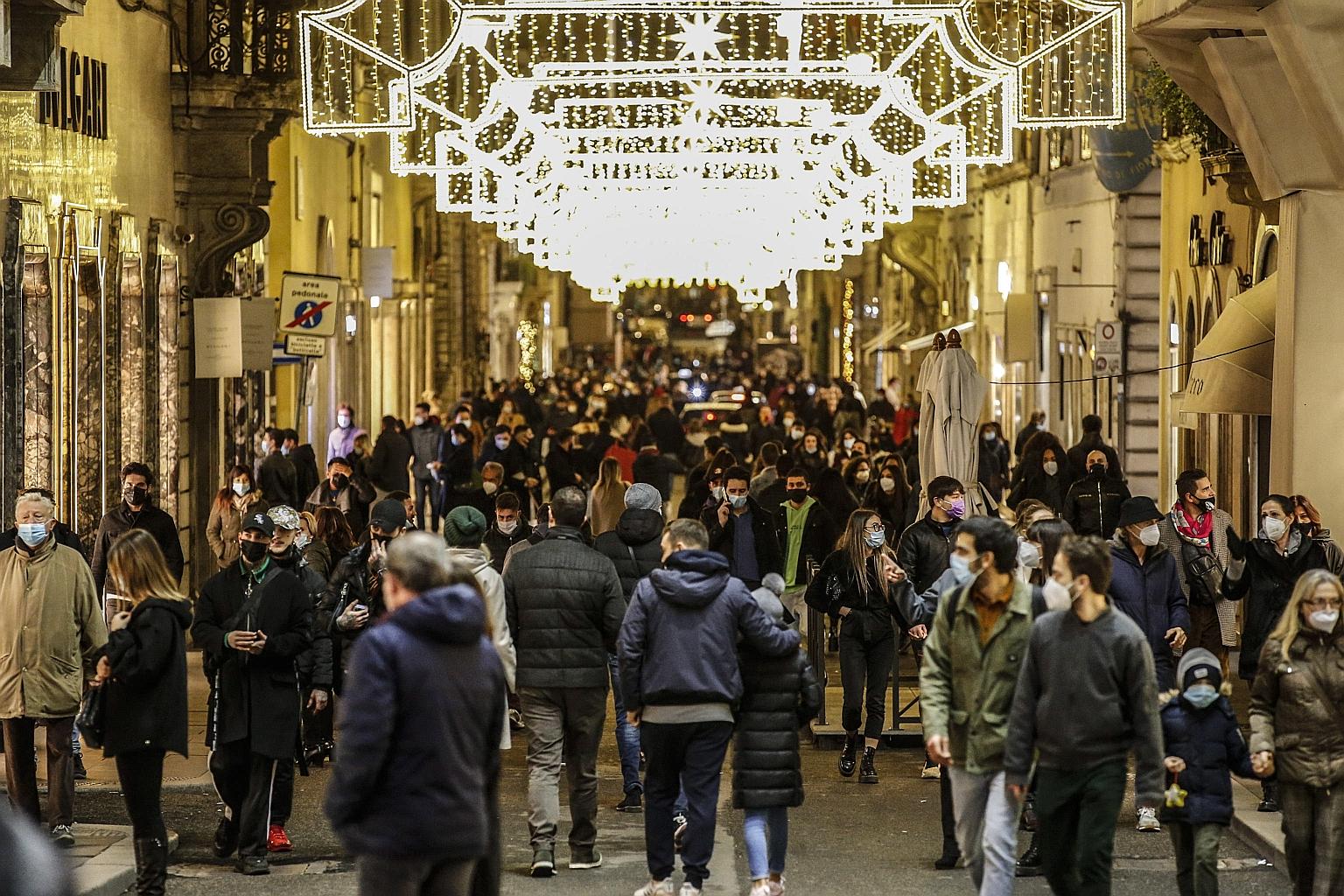 Rome's famous Via Condotti shopping street on Sunday. Italy, the first European country hit by Covid-19, yesterday announced national travel restrictions for the Christmas holidays. The new rules, together with an existing curfew and other regulation