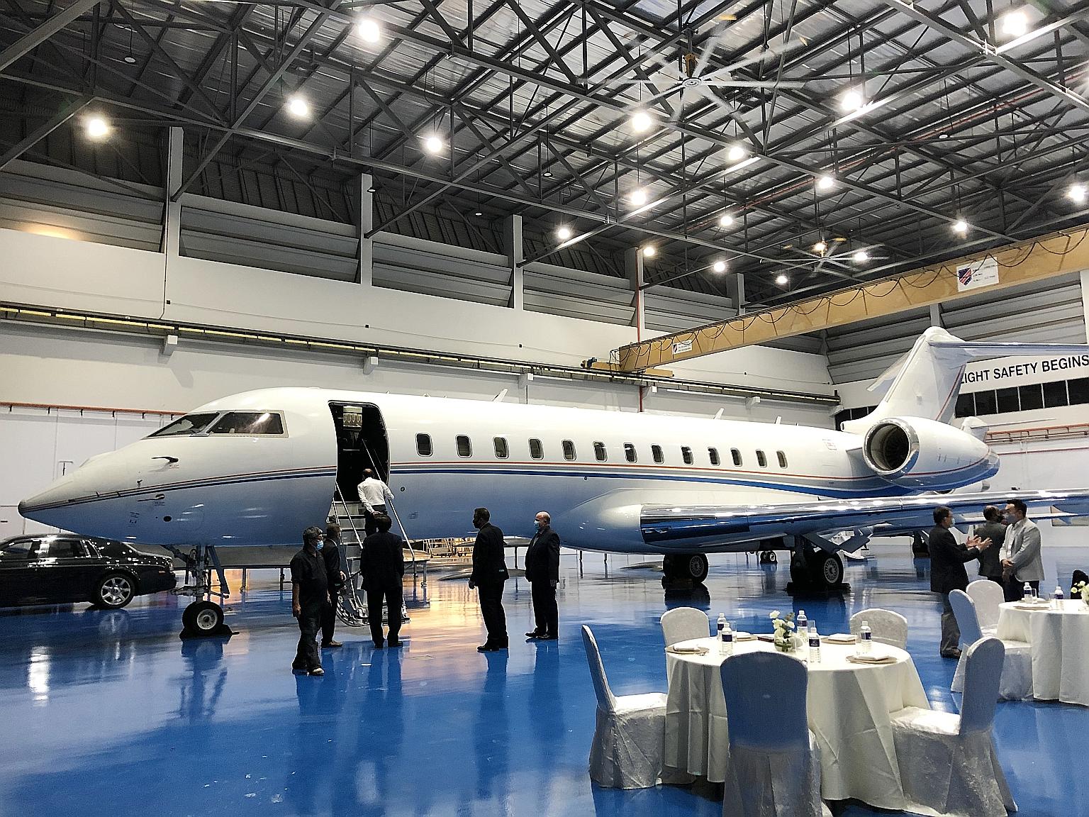 A plane at Kelley Aerospace's hangar in Seletar Aerospace Park, its first facility in Singapore. The American firm is launching three programmes here, one of which involves buying 100 aircraft that will fly private clients around the world. ST PHOTO: