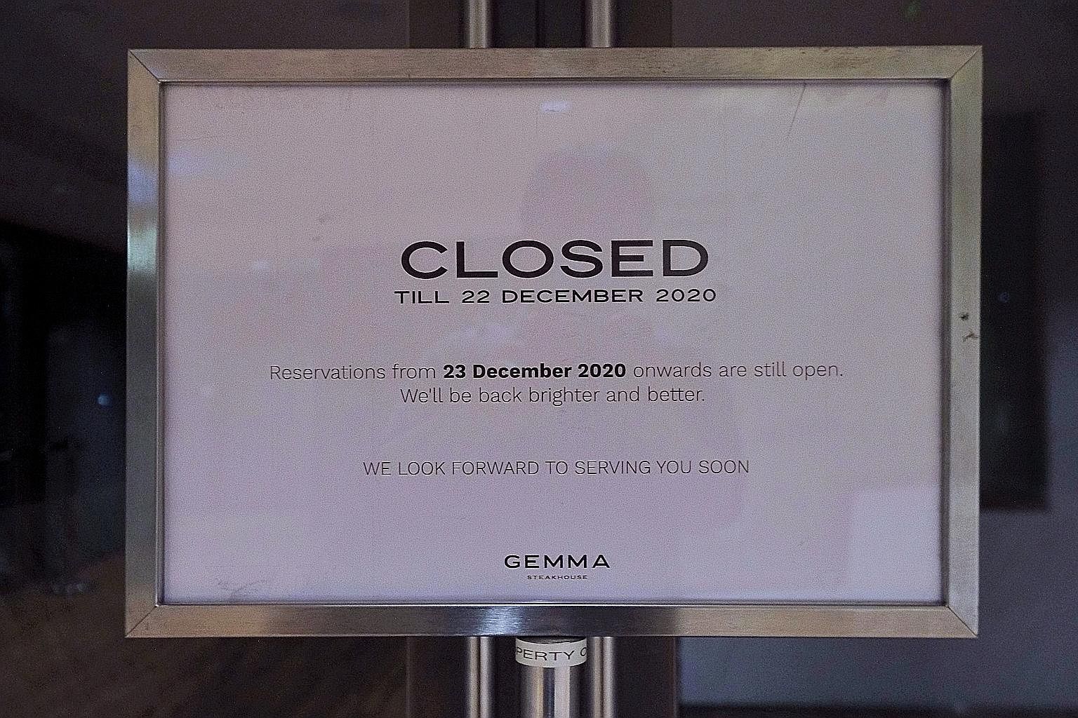 A sign outside the restaurant informing patrons it is accepting bookings for Dec 23 onwards. Gemma Steakhouse at the National Gallery Singapore has been ordered to close for 20 days until Dec 22 for accepting a large group booking and for failing to 
