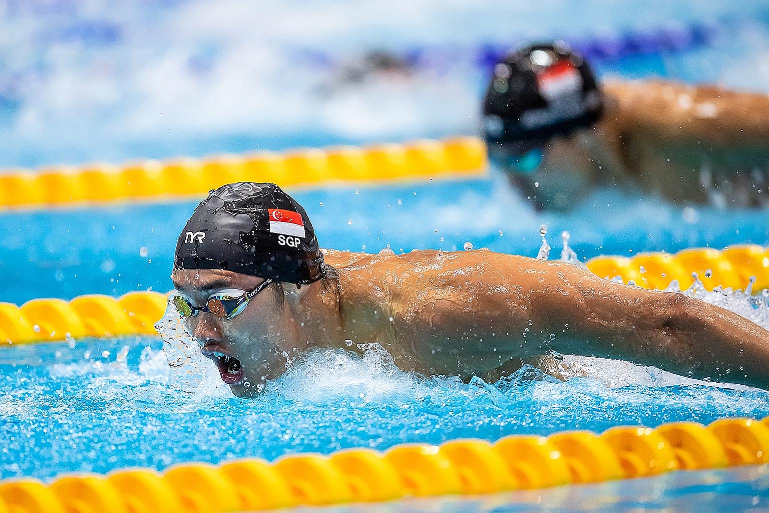 Teong Tzen Wei on his way to clocking 52.55sec in the 100m fly at the OCBC Aquatic Centre on Friday to make the Olympic B time.