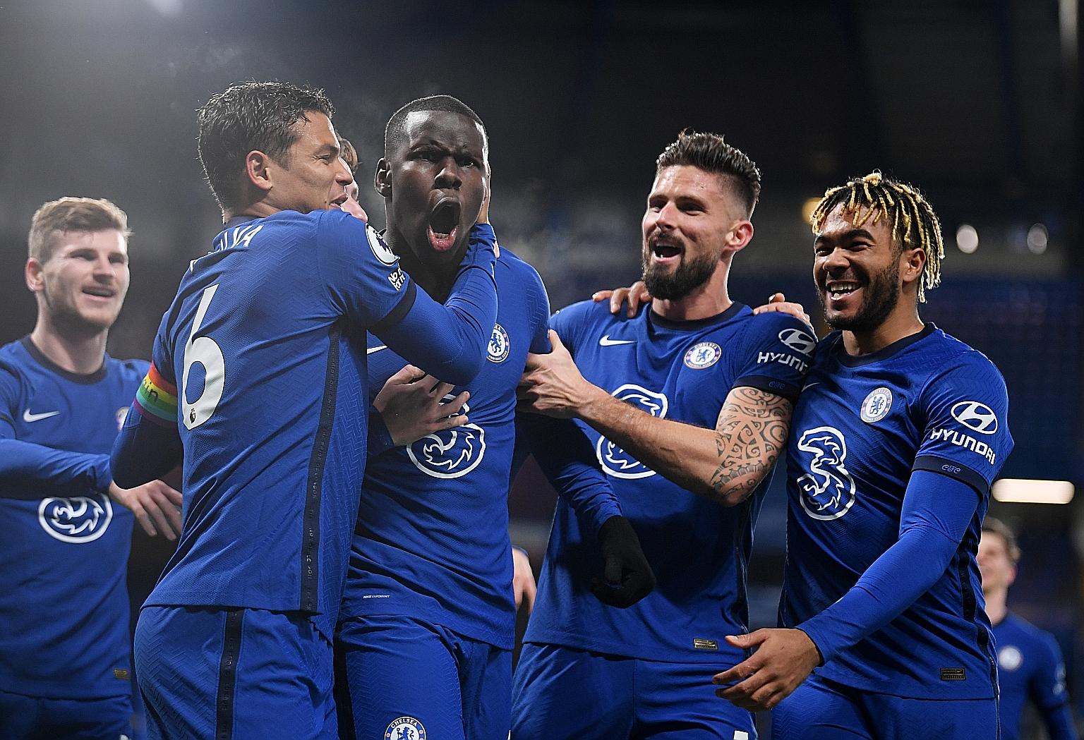 Kurt Zouma celebrating after scoring Chelsea's second goal with (from left) Thiago Silva, Olivier Giroud and Reece James, as Timo Werner rushes to join in. The Blues beat Leeds 3-1 in front of 2,000 fans at Stamford Bridge.