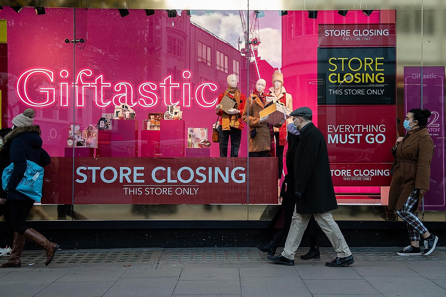 Shoppers queueing to enter a Debenhams department store in London last Saturday. The retailer has been struggling for many years, weighed down by costly stores with hefty rents and large property taxes.