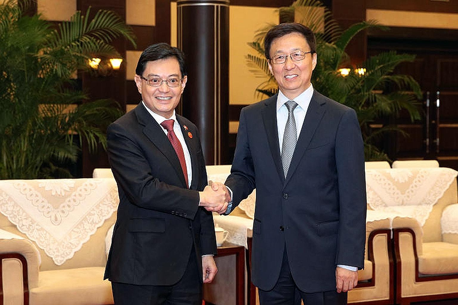 Deputy Prime Minister Heng Swee Keat (left) and Chinese Vice-Premier Han Zheng meeting in China's south-western city of Chongqing in October last year. At the Joint Council for Bilateral Cooperation, both countries will discuss ways to improve health