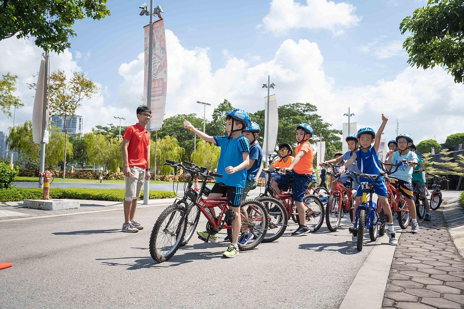 At holiday events, children got to try out sports like spike ball, cycling and basketball during last year's edition of the Sports Development Series organised by the Singapore Sports Hub.