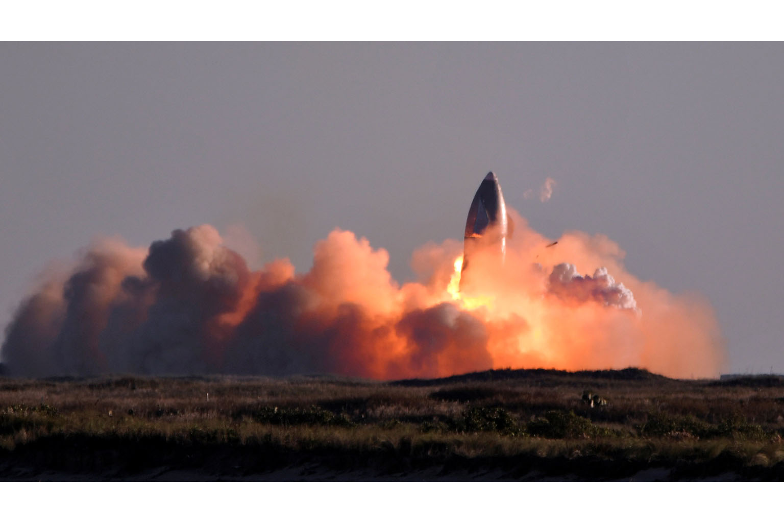 SpaceX's Starship SN8 rocket prototype exploding during a landing attempt after a test launch in southern Texas on Wednesday. The firm hopes that the Starship rocket will become its go-to for Mars missions. Construction on SN9, the next prototype, is