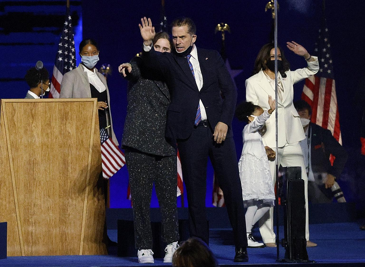 Mr Joe Biden's son Hunter celebrating at an election rally last month in Wilmington, Delaware, after the media announced his father had won the US presidential election. The President-elect's stated commitment to independent law enforcement will be t