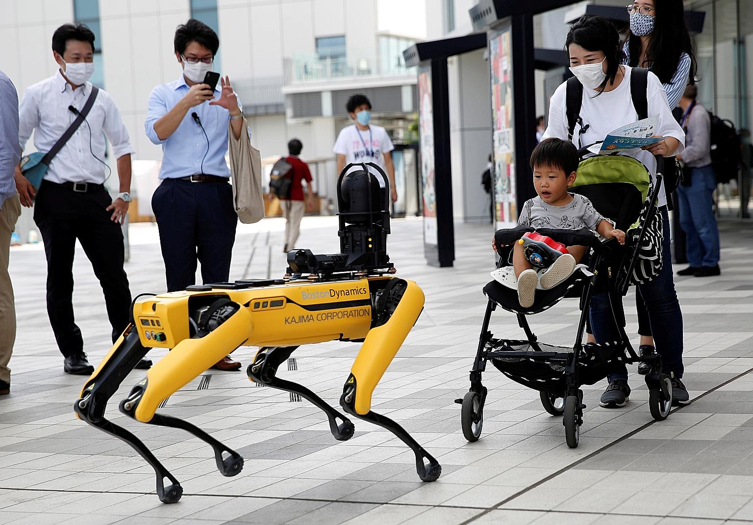 Boston Dynamics' dog-like robot Spot during a demonstration at a Tokyo event in September. Hyundai, with its acquisition of Boston Dynamics, can leverage the US firm's robot technology to expand automation at its unionised car factories, as well as d