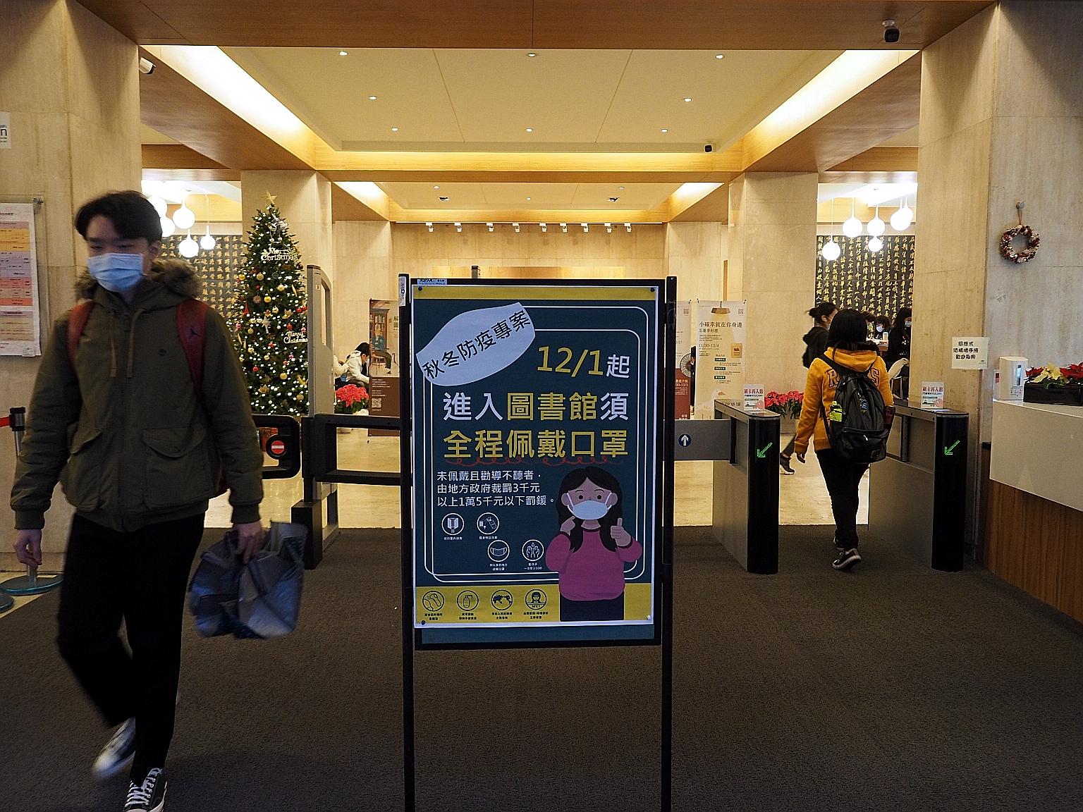 This sign at a university library in Taipei earlier this month warns all visitors to be masked up or face a stiff fine. The CAAS said that Taiwan has controlled the spread of the Covid-19 virus.