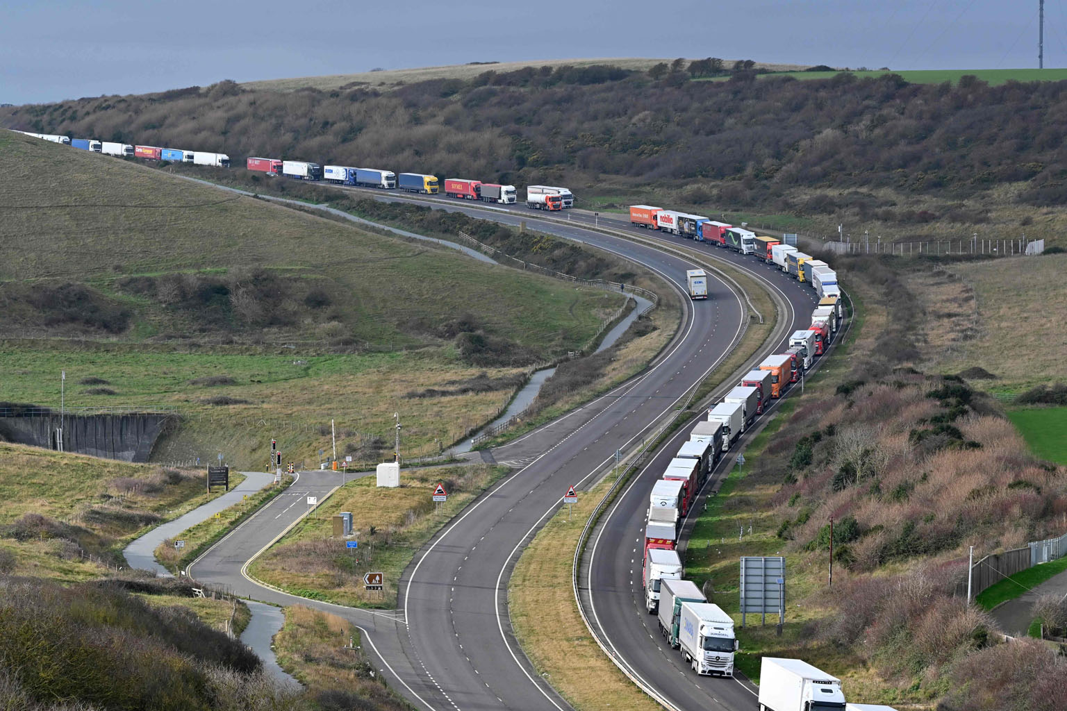 A long line of lorries carrying freight heading to the port of Dover on England's south coast on Thursday. Lorries were backed up to prevent the port from becoming overwhelmed.