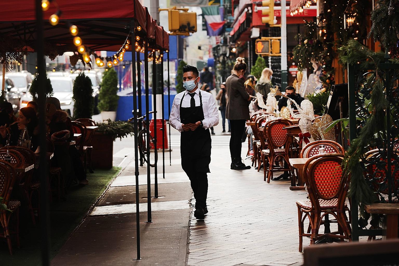 A restaurant in Manhattan, New York City, on Friday. The decision to suspend indoor dining is a crushing blow to the city's restaurant industry, an economic pillar that has been struggling all year.