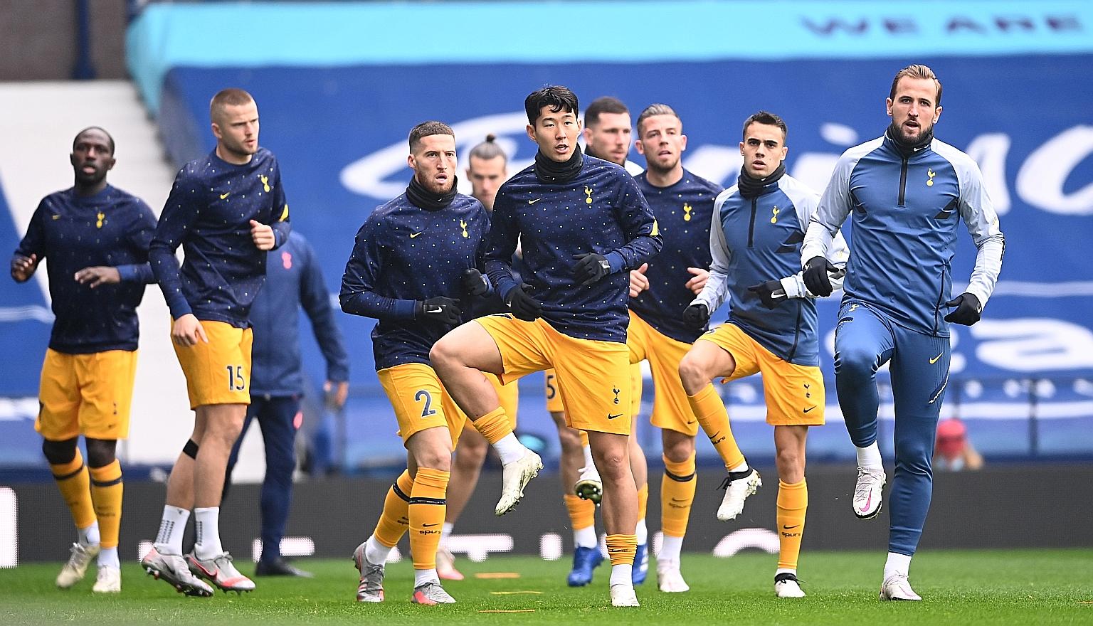 Son Heung-min, Harry Kane and teammates warming up before a game last month. They have combined for 18 Tottenham goals so far this season. PHOTO: REUTERS