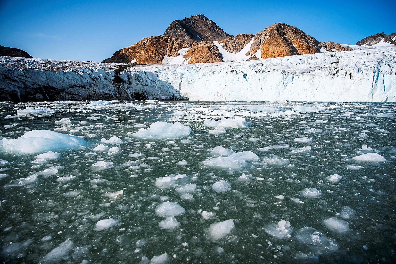 Broken ice from the Apusiajik glacier on the south-eastern shore of Greenland in a photo taken in August 2019. At the Climate Ambition Summit on Saturday, leaders failed to raise the bar, offering only incremental steps.