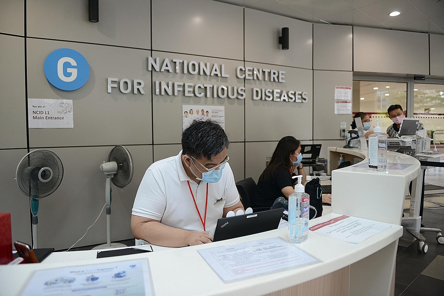 The benefits of early vaccination are significant for those in the high-risk group, such as healthcare workers and people doing swab tests, as they are more exposed to possible infection. ST PHOTO: SHINTARO TAY