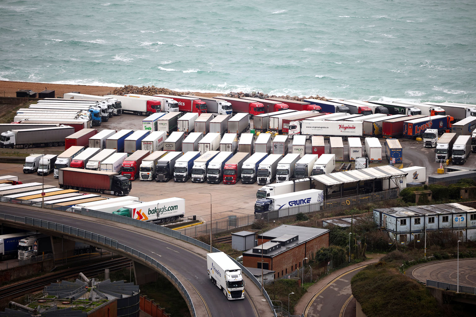 Lorries parked up in the Port of Dover, in Britain, on Sunday. Imports to the United Kingdom have been disrupted due to high volumes of traffic at ports linked to Brexit-related stockpiling as well as Covid-19.