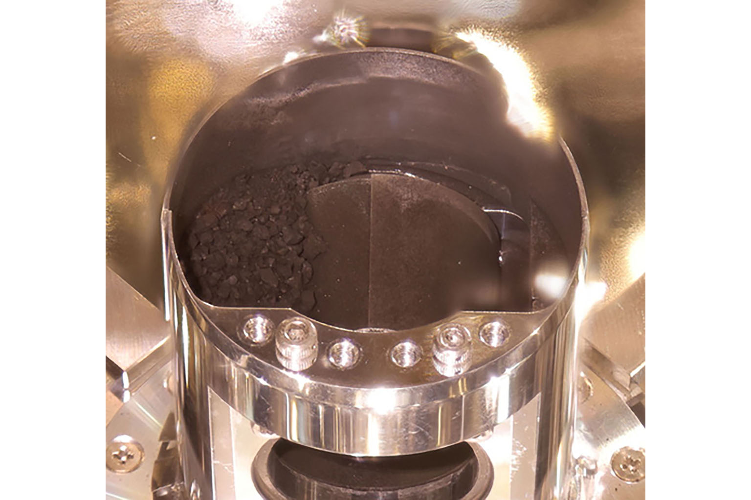 Samples of surface dust and pristine material collected from the asteroid Ryugu by the space probe Hayabusa2 at the Japan Space Exploration Agency campus in Sagamihara, Kanagawa prefecture in Japan. PHOTO: JAXA