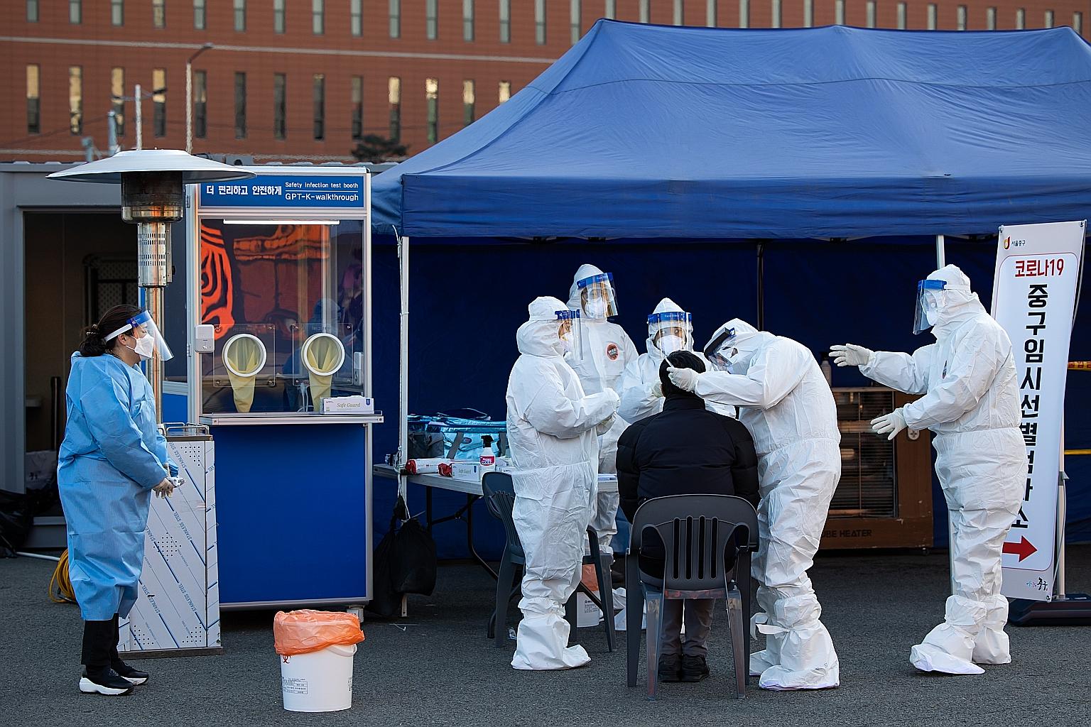 A temporary Covid-19 testing station in Seoul on Monday. Such stations are part of South Korea's pre-emptive measures to sniff out asymptomatic cases.