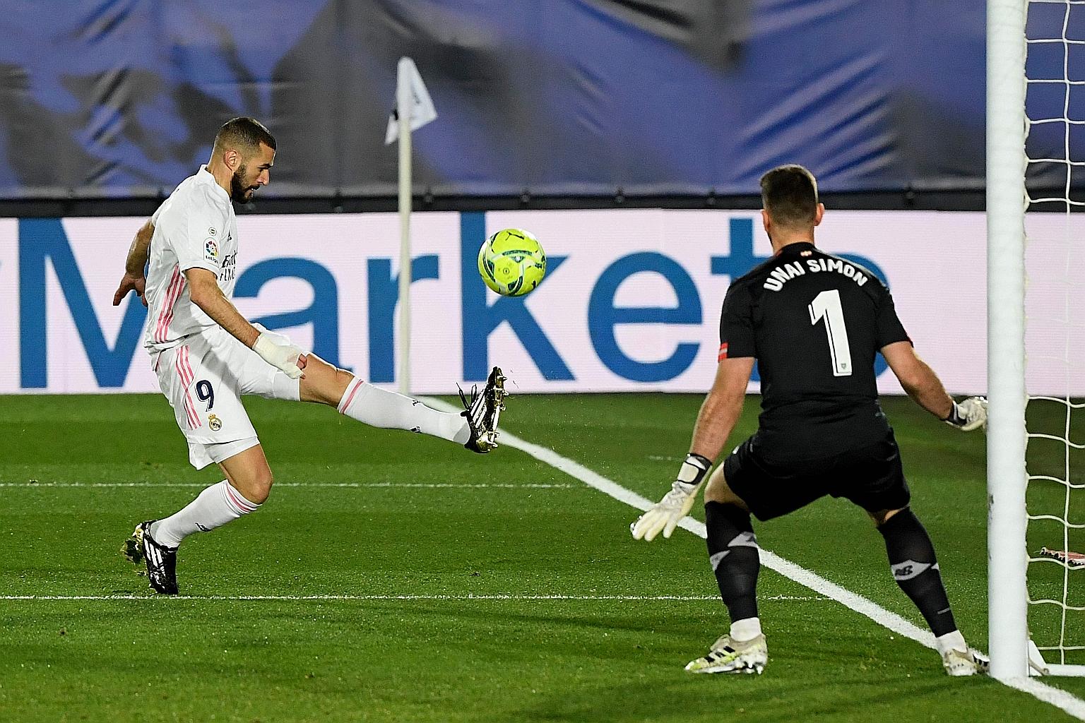Karim Benzema unable to finish past Athletic Bilbao's Unai Simon. He was more successful on two other occasions, earning Real Madrid a 3-1 win.