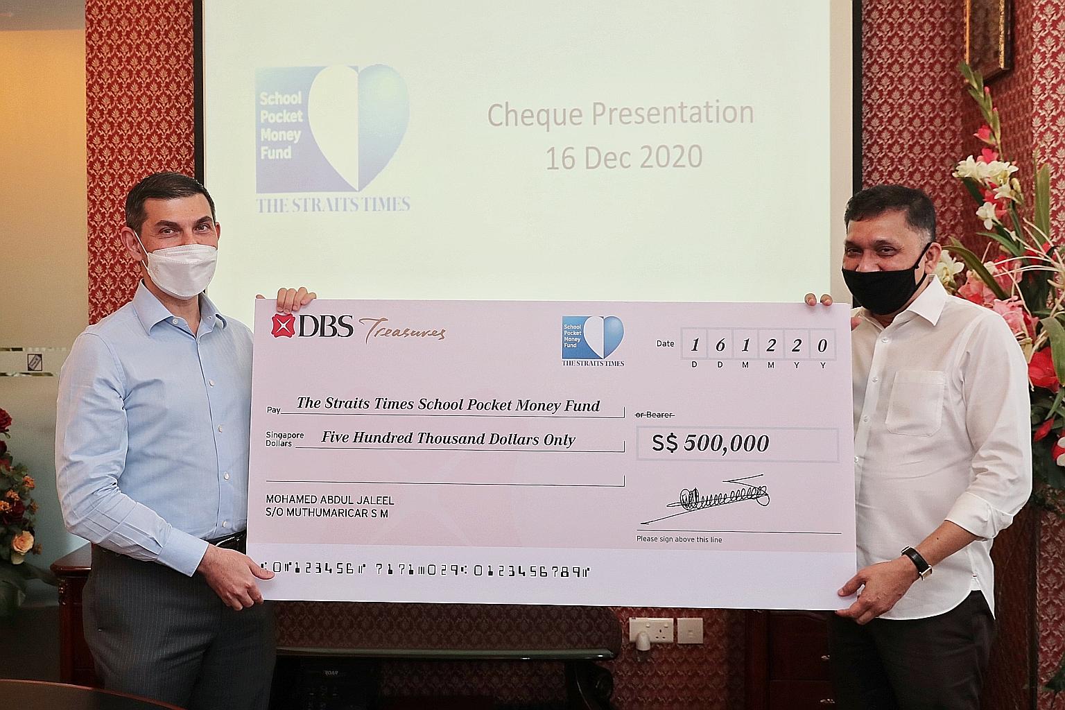 The Straits Times School Pocket Money Fund chairman and ST editor Warren Fernandez (left) with Mr Mohamed Abdul Jaleel yesterday. Mr Jaleel has donated a total of $4.5 million to the fund since 2010.
