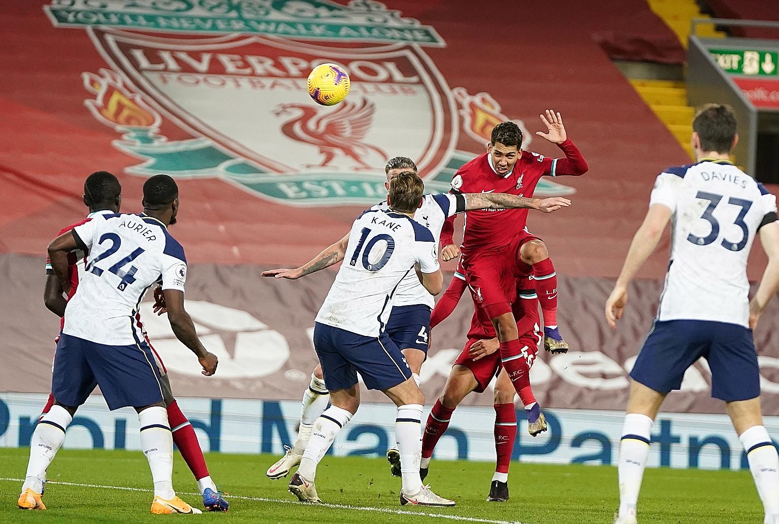 Roberto Firmino heading in at the stroke of full time to give Liverpool a 2-1 win over Spurs at Anfield on Wednesday. The Reds lead the Premier League table by three points from the north Londoners.