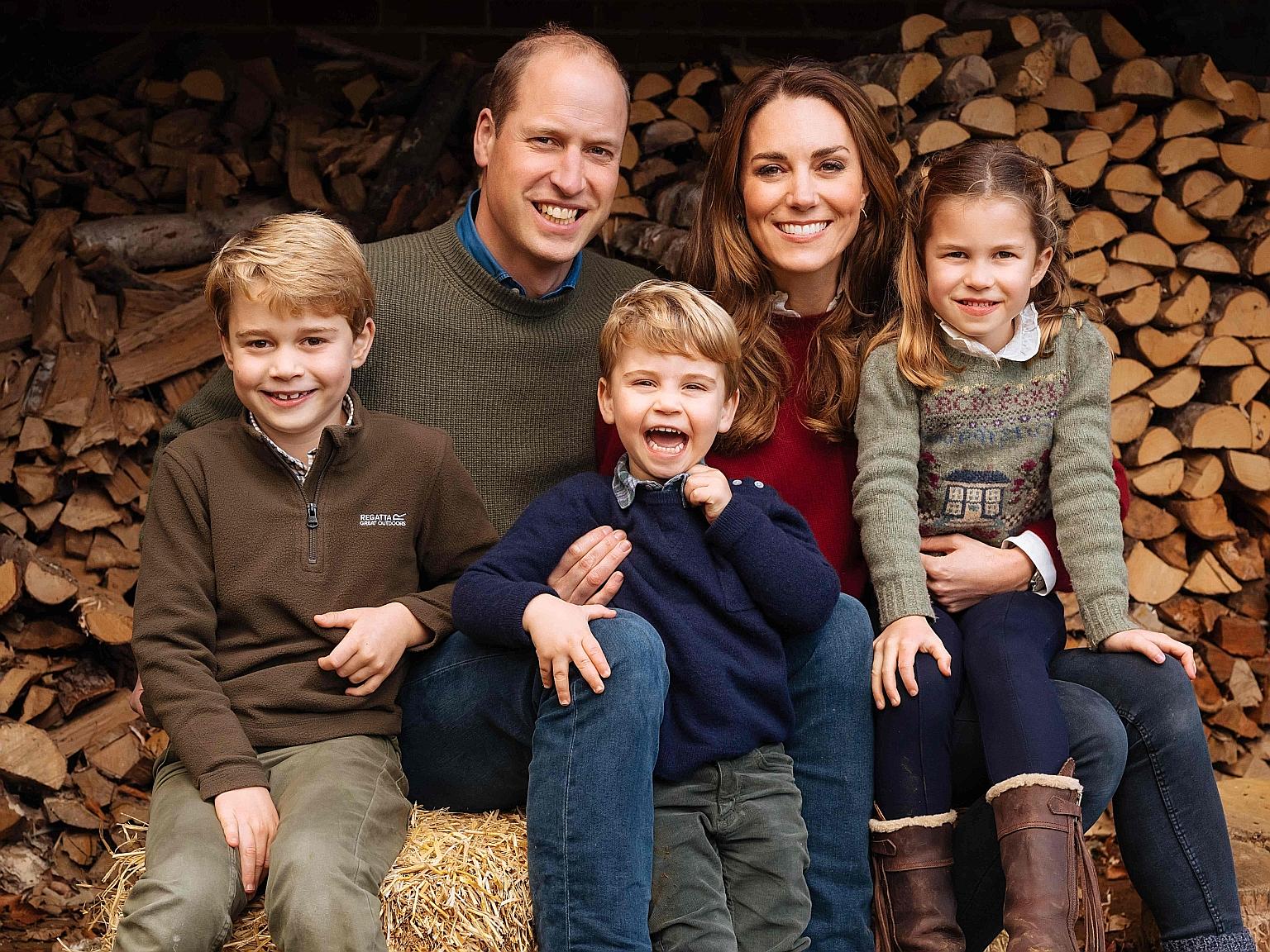 ROYAL CHRISTMAS: The Duke and Duchess of Cambridge have shared a photograph of their family for their annual Christmas card. 	Prince William, 38, second in line to the throne, is pictured with his wife Kate Middleton, 38, and their three children - P