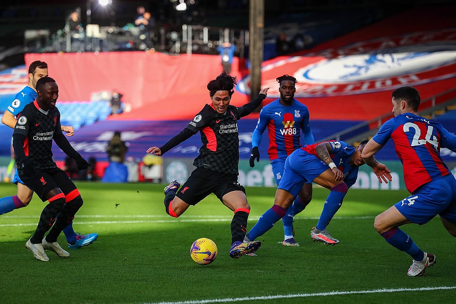 Liverpool's Japanese striker Takumi Minamino opening the scoring after just three minutes in their match against hosts Crystal Palace yesterday. It was his first EPL goal.