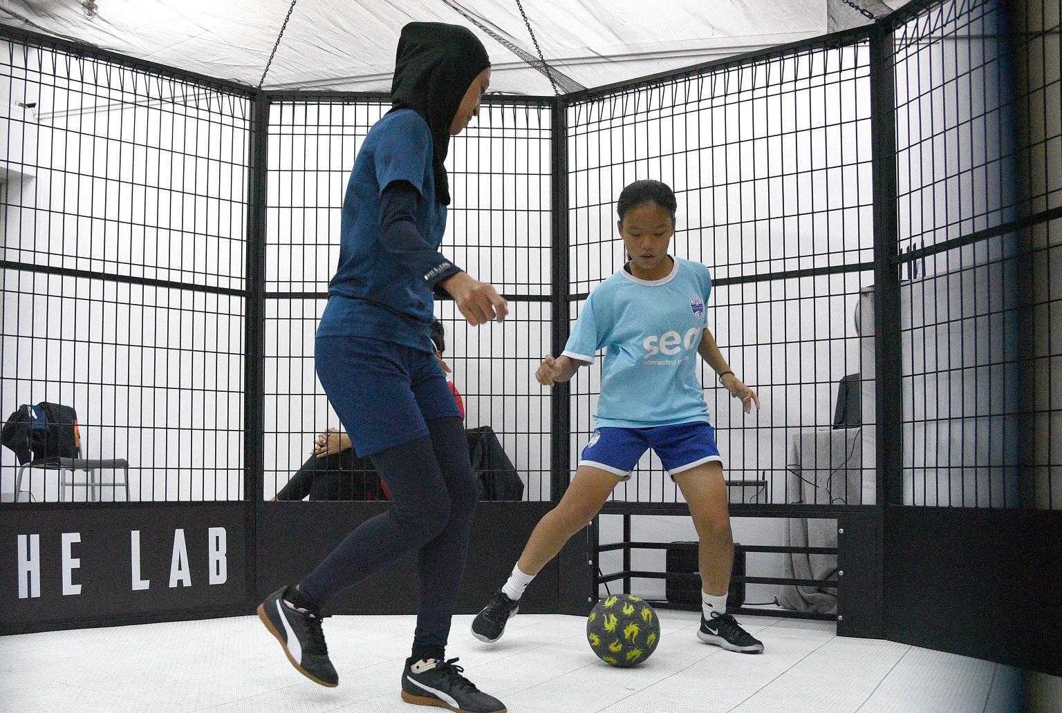 Tiong Bahru's Nur Faradila Rafidi trying to dispossess Lion City Sailors' Chloe Koh in the inaugural FAS Women's Panna Challenge 2020 at Expy The Lab yesterday. The Dec 16-20 challenge, which featured five clubs from the women's leagues, is based off