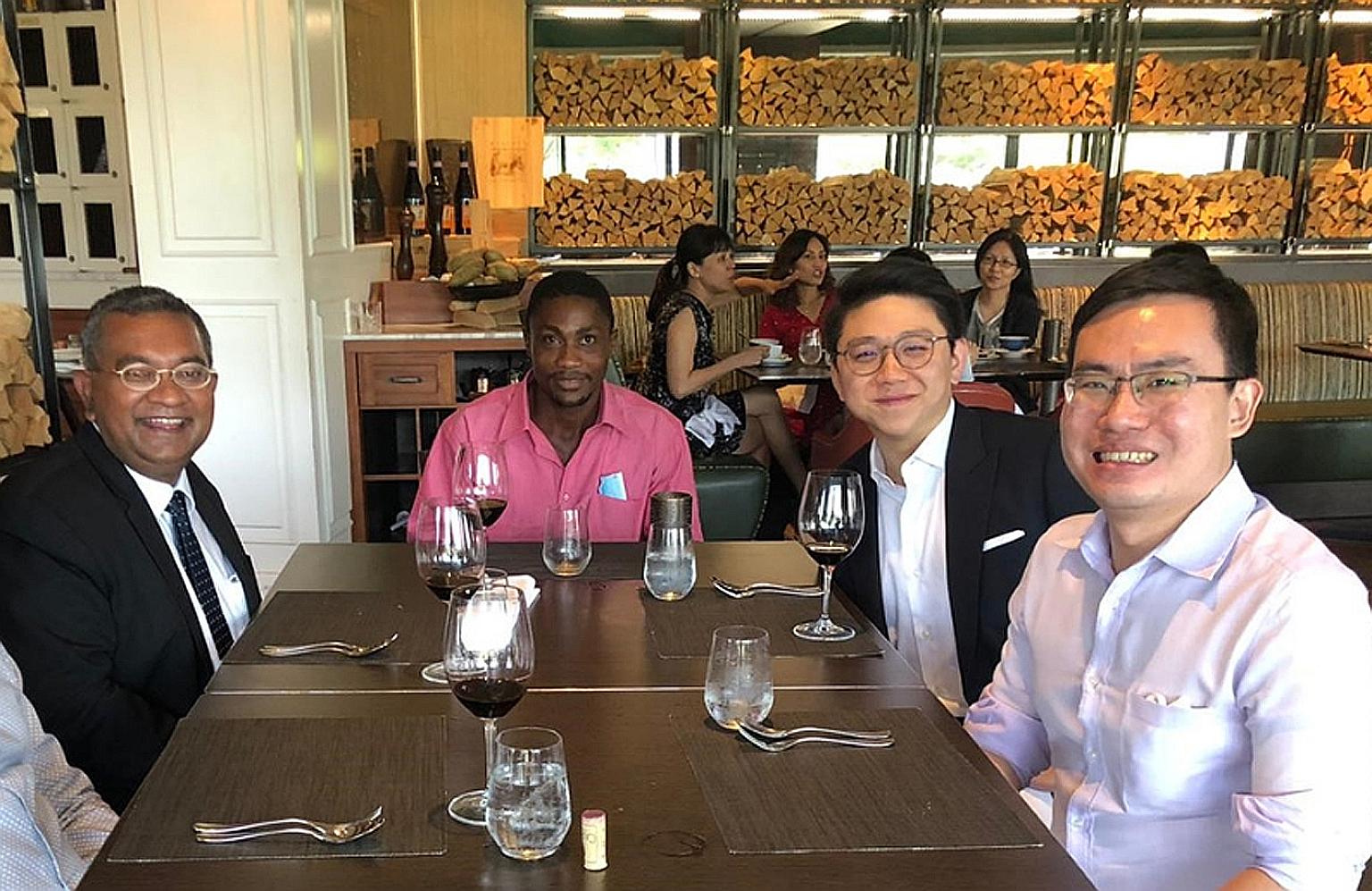 (From left) Lawyer Eugene Thuraisingam, Mr Ilechukwu Uchechukwu Chukwudi, as well as Mr Johannes Hadi and Mr Suang Wijaya - both of whom were also members of the legal team that handled Mr Ilechukwu's case - at a lunch in October before Mr Ilechukwu'
