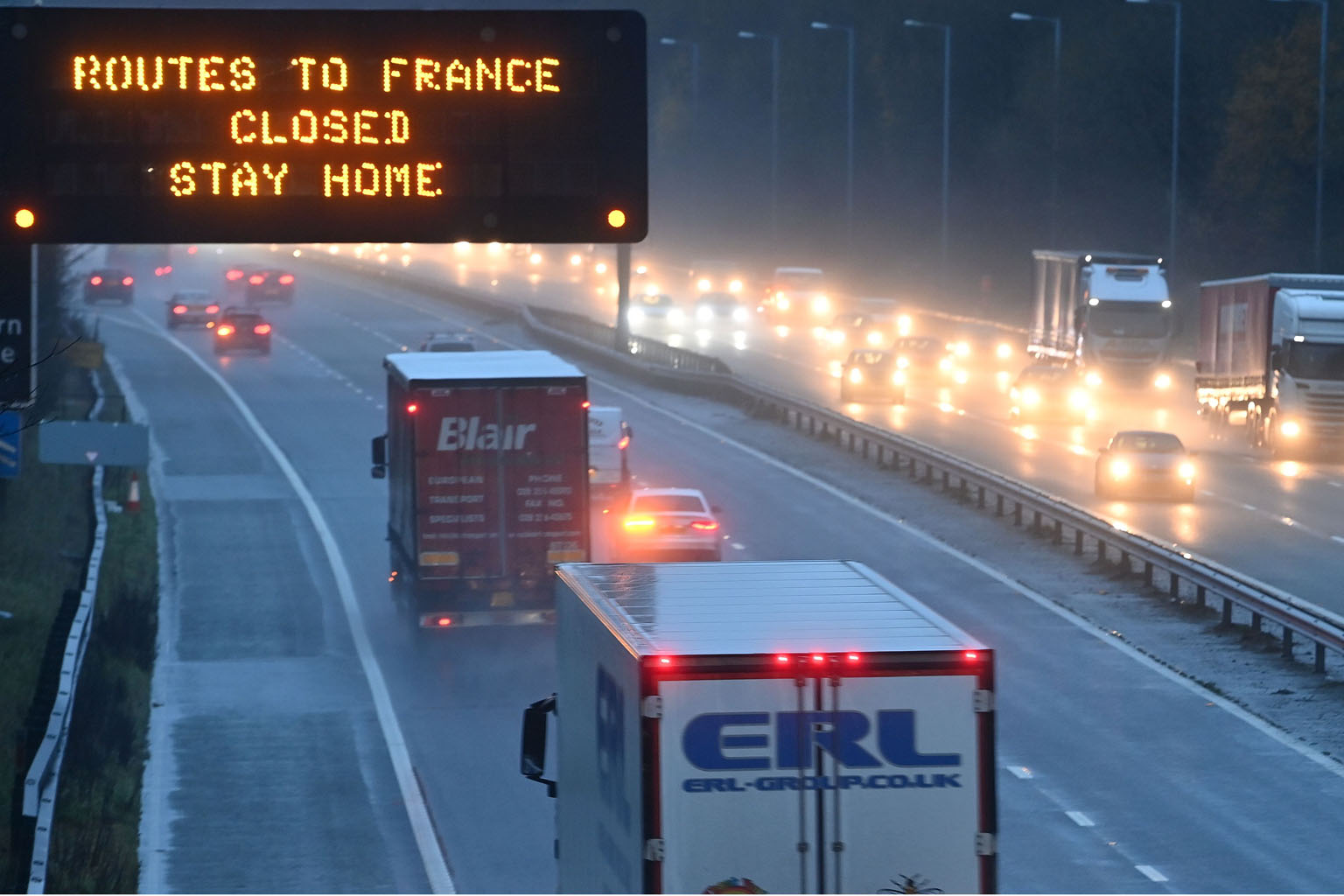 A sign on the M56 motorway in England yesterday informing drivers that all routes into France are closed. British supermarket chain Sainsbury's said shortages will appear within days if transport ties are not quickly restored.
