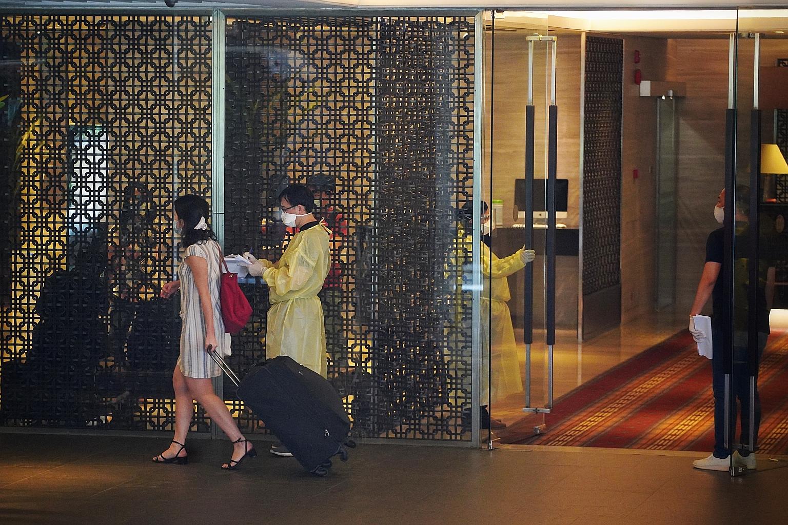 Guests leaving Mandarin Orchard on Sunday. Education Minister Lawrence Wong, who co-chairs the multi-ministry task force, said that what happened at the hotel "is yet another reminder that things can go wrong". The minister added that Singapore's SHN