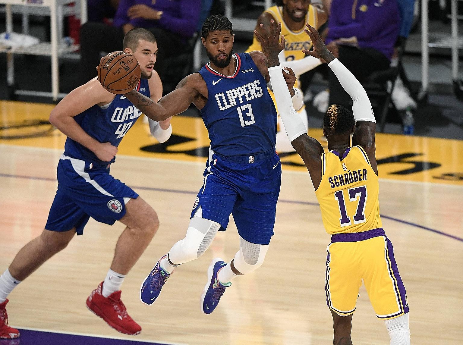 All-Star Paul George (centre) leading the Los Angeles Clippers with 33 points in their 116-109 win over city rivals Lakers in the opening game of the National Basketball Association (NBA) season on Tuesday. The Clippers never trailed and led by as ma