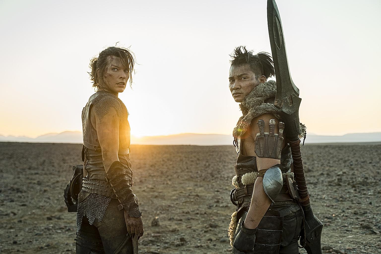 Milla Jovovich and Tony Jaa (both above) in Monster Hunter.