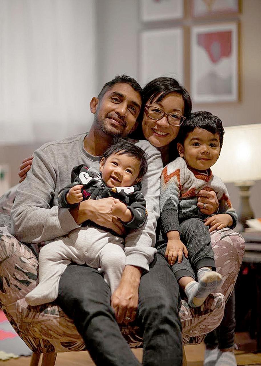 Dr Dilane Peiris with his wife Nora, 21/2-year-old son Fergus and seven-month-old boy Magnus. While the doctor can continue on his flight from London to Melbourne under the latest curbs, his family members, who are British nationals, will not be allo