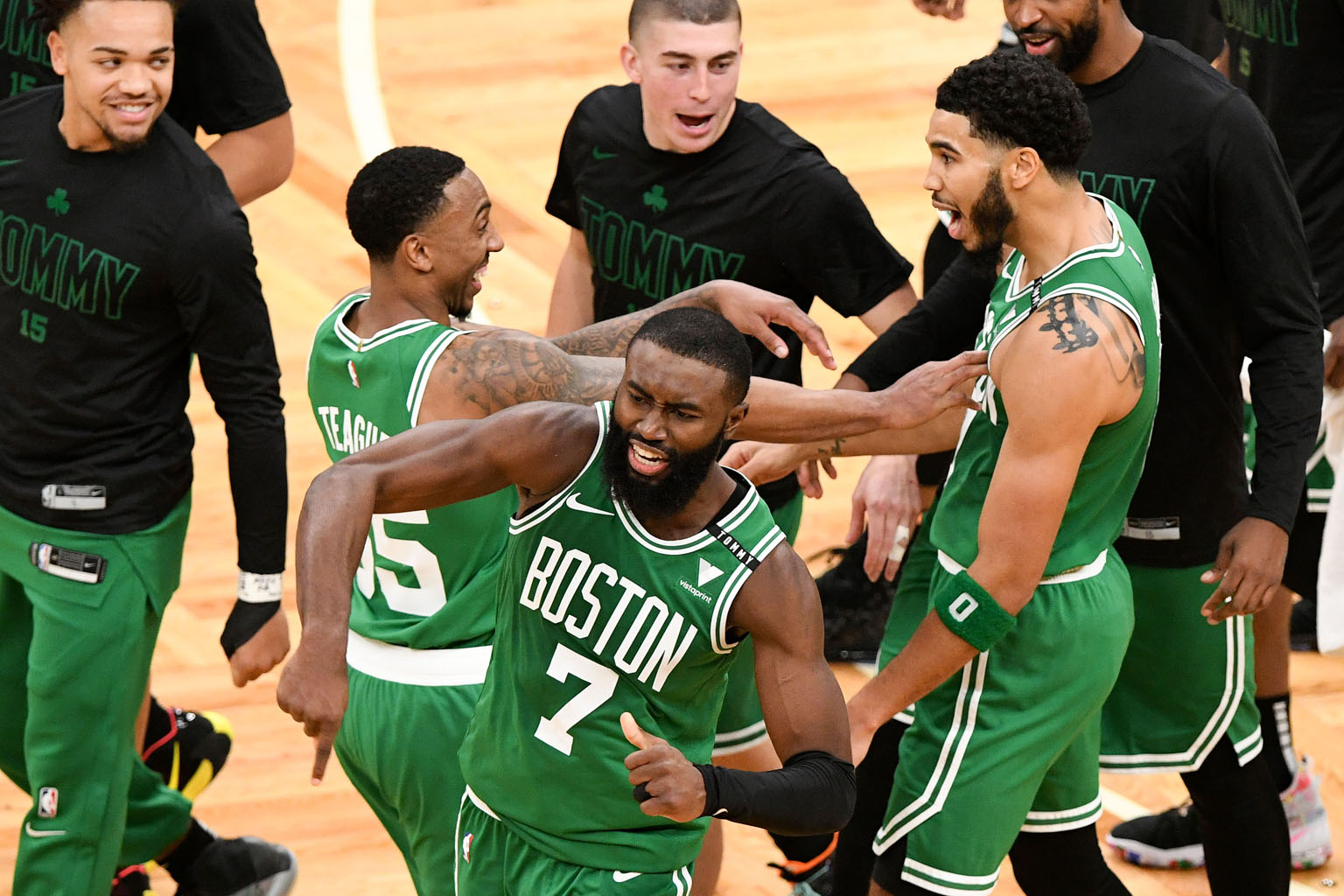 Boston Celtics forward Jayson Tatum (right) celebrating with Jeff Teague and Jaylen Brown during their season opener against the Bucks at TD Garden. Tatum drilled a go-ahead three-pointer off the backboard over the 2.11m Giannis Antetokounmpo, the re